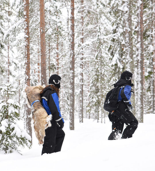 Snowshoeing through the forest