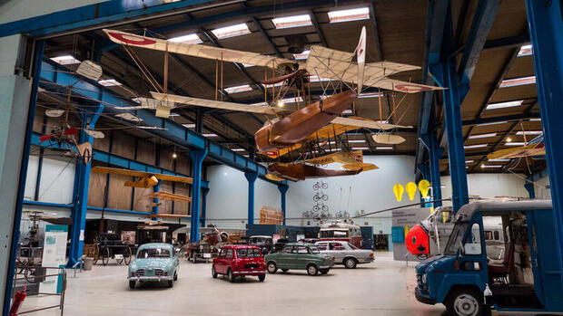 Danish Museum of Science and Technology with historic cars and planes on display