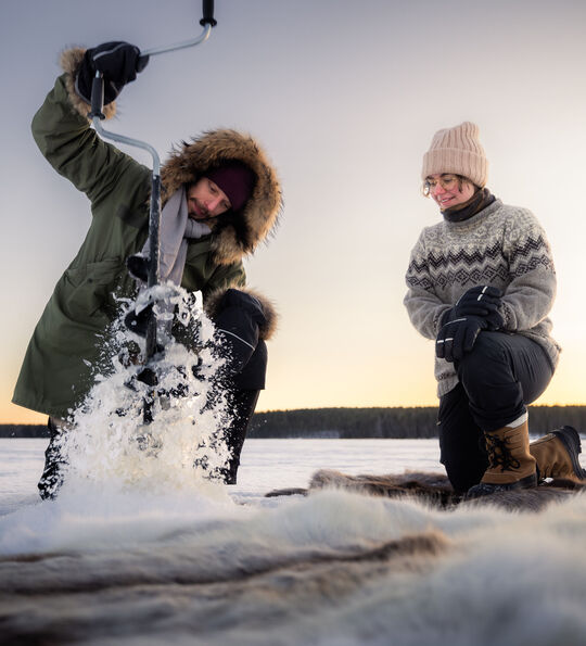 Ice fishing in Finnish Lapland
