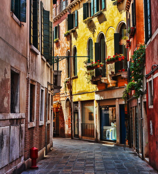 A view along a narrow street in the heart of historic Venice