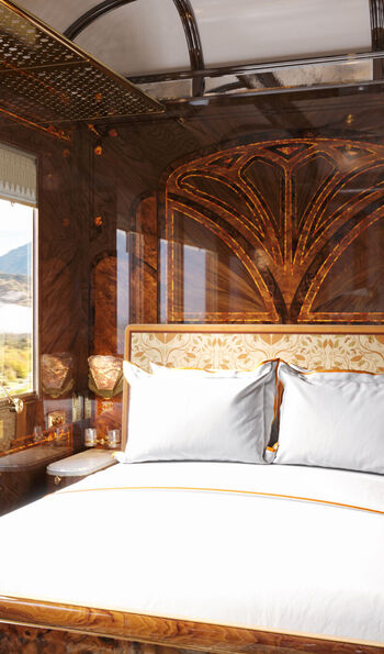 Le Foret Bed in the Suite accommodation aboard the Venice Simplon-Orient-Express