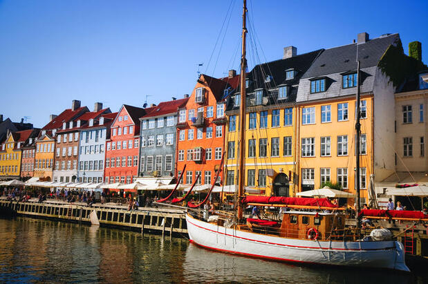 Colourful buildings of Nyhavn with boat