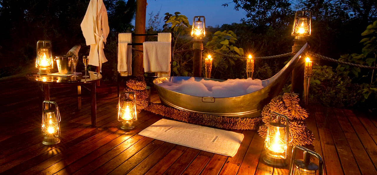 Outdoor bathtub at Sanctuary Baines Camp, Botswana