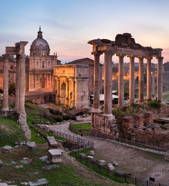 A view across the runs of the Roman Forum at dusk, Rome, Italy