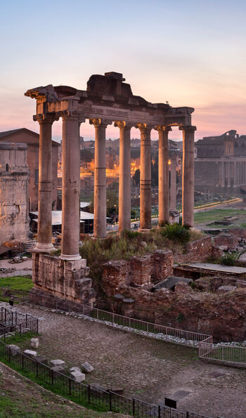 Ruins of the Roman Forum at sunset in Rome, Italy