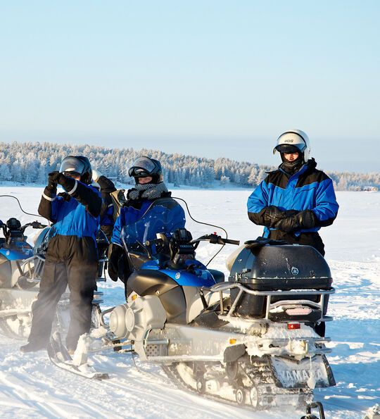 Snowmobiling on the frozen sea