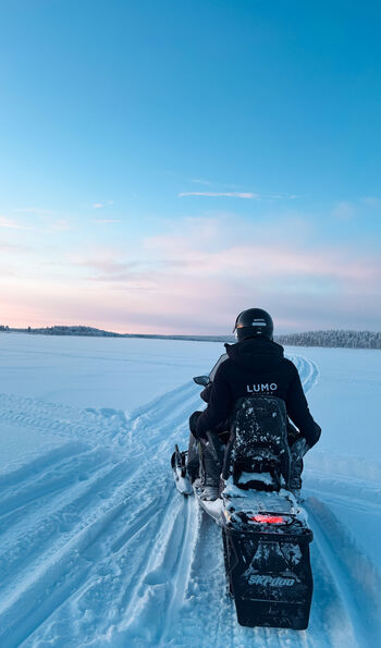 Snowmobiling at Arctic Lumo Resort