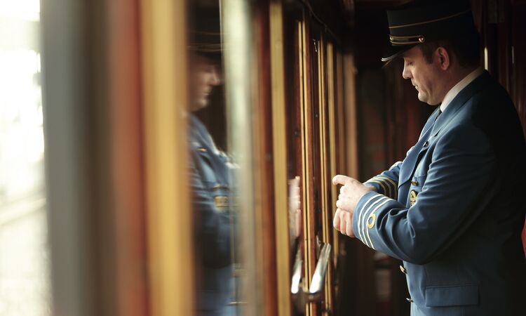 Great Escapes: rail holidays from Wexas Travel - image of a steward aboard the Venice Simplon-Orient-Express