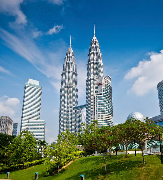 The Petronas Twin Towers form an famous 88-story skyscraper in Kuala Lumpur, Malaysia